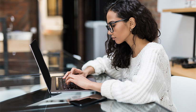 Woman creating content for a website